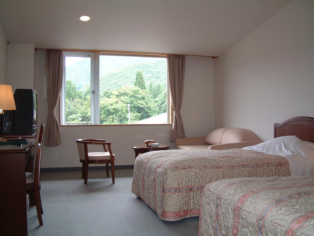 Hotel Kamiyu Onsen Club Uonuma Esterno foto